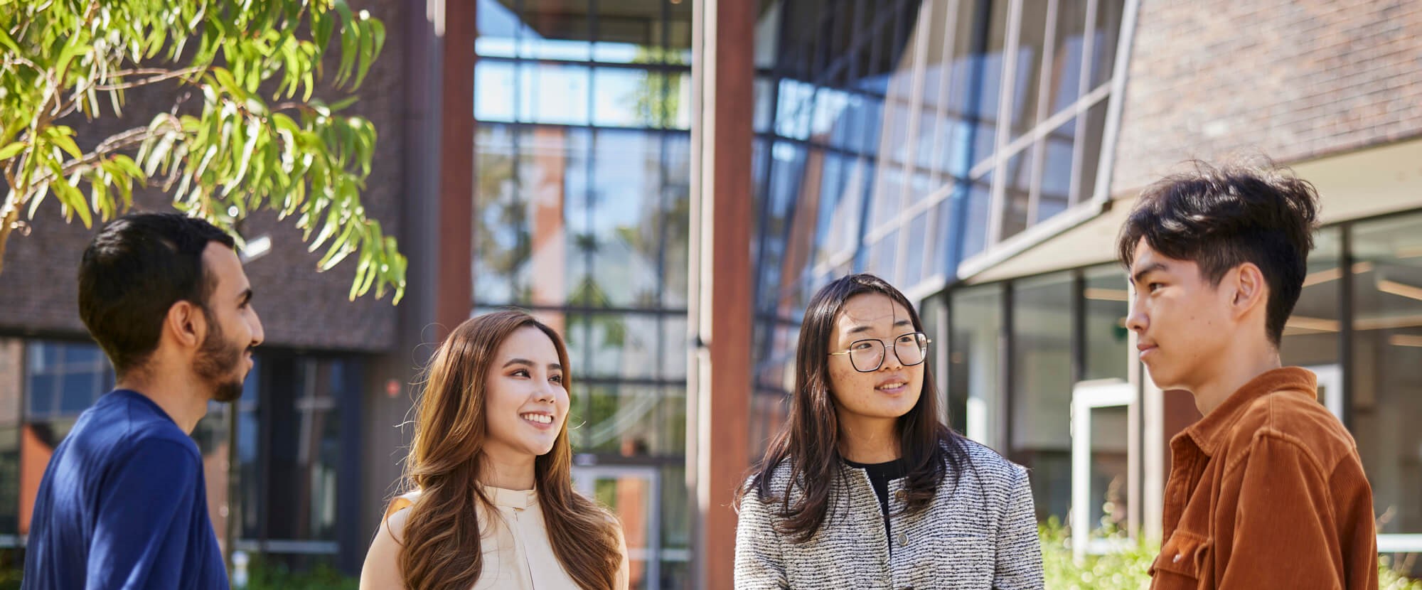 Students talking outside in the Trinity campus