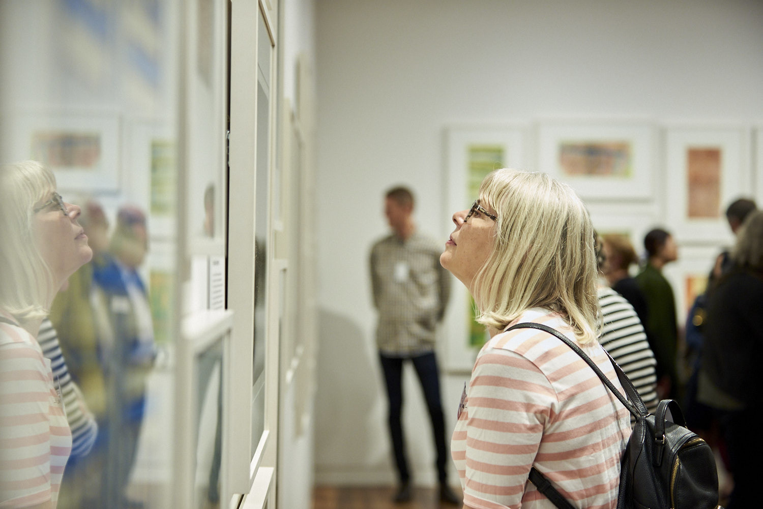Woman in art gallery